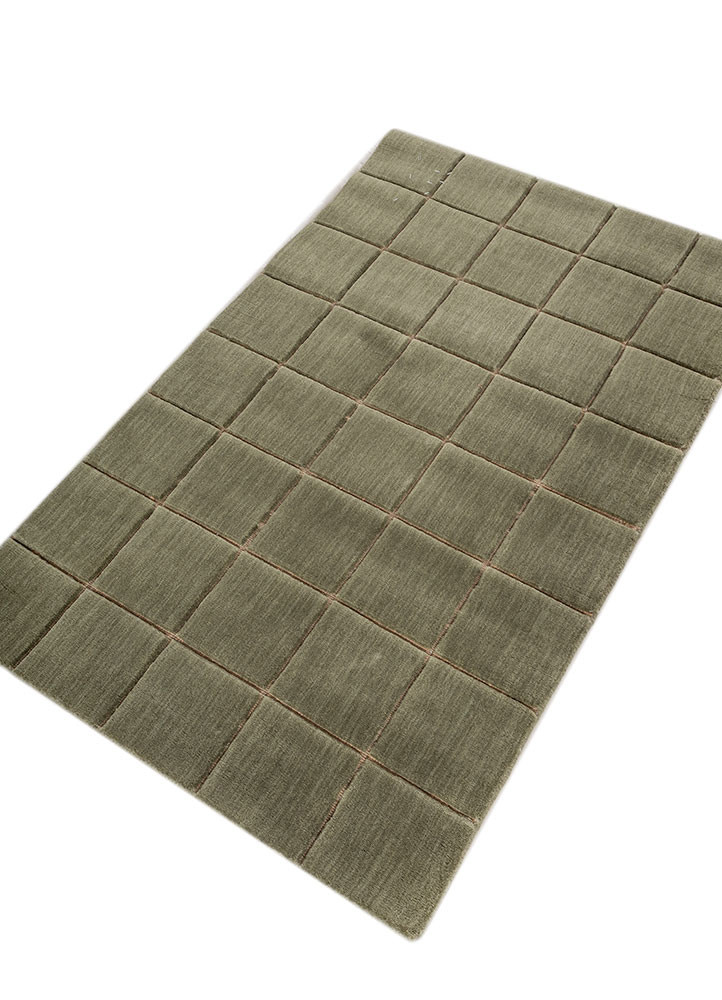 aprezo green wool hand loom Rug - FoldShot aprezo green wool hand loom Rug - FoldShot