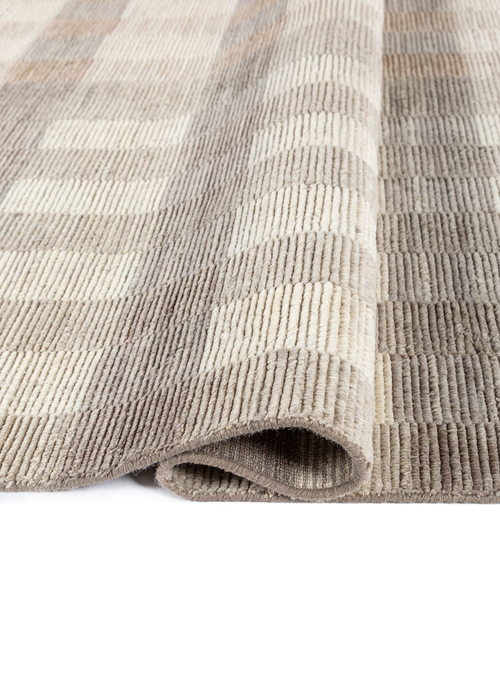 saga ivory wool hand loom Rug - FoldShot