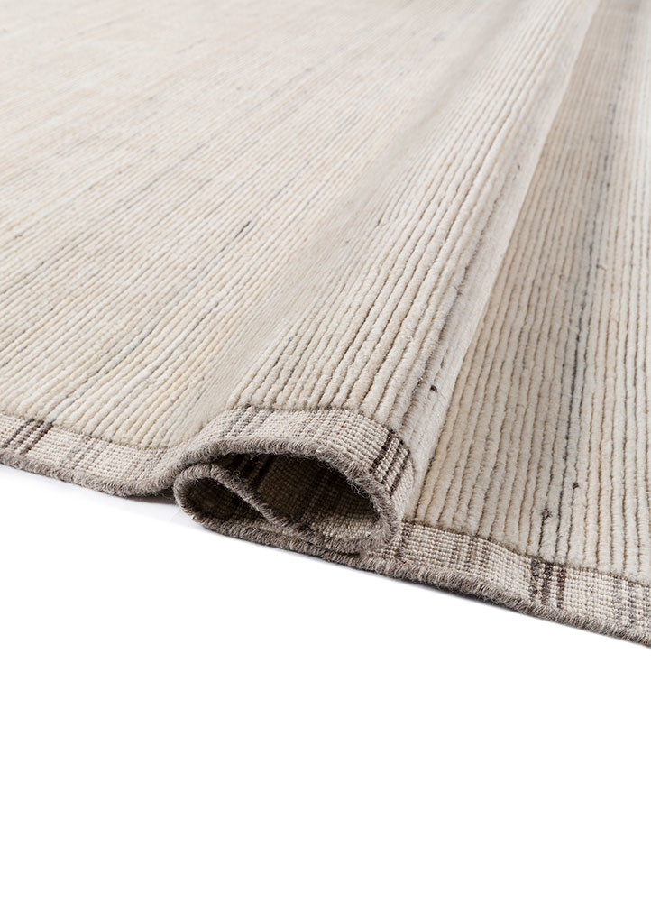tesoro ivory wool hand loom Rug - FoldShot tesoro ivory wool hand loom Rug - FoldShot