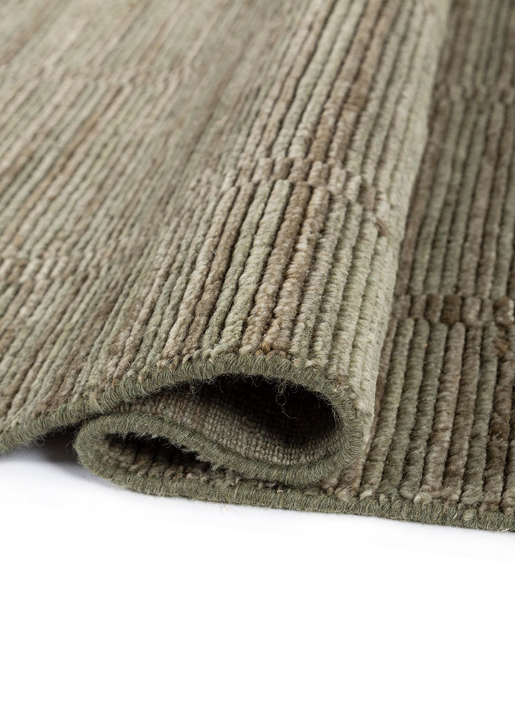 saga green wool hand loom Rug - FoldShot