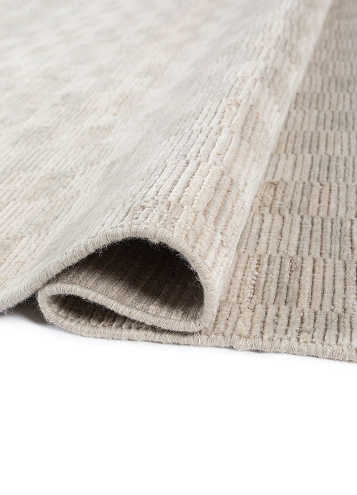 saga ivory wool hand loom Rug - FoldShot