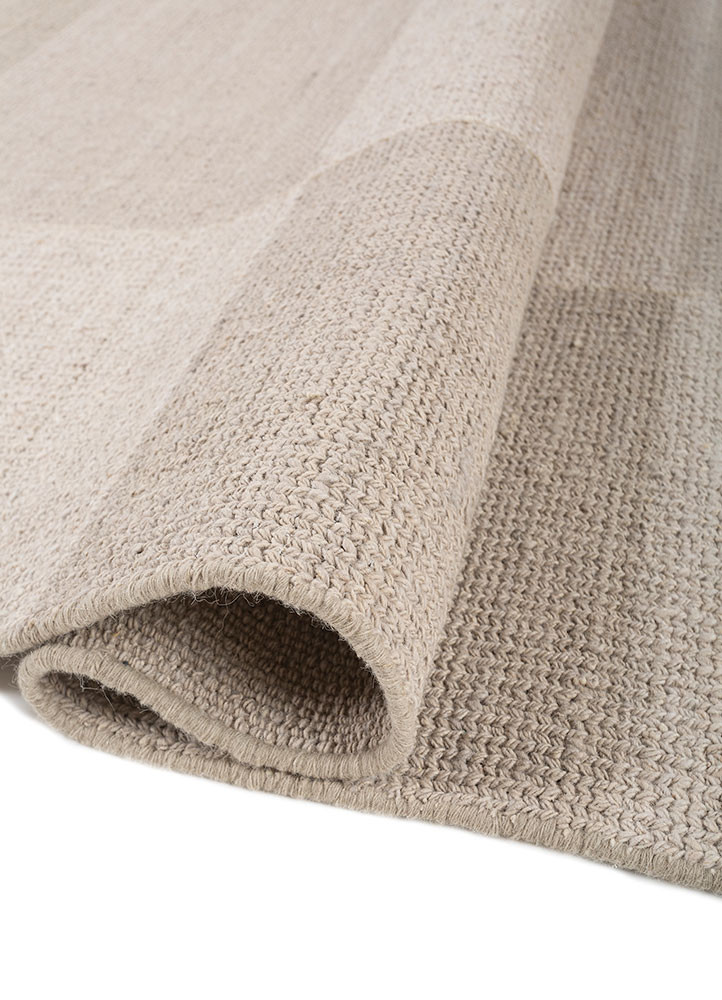 contour ivory wool hand loom Rug - FoldShot