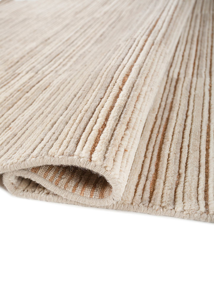contour gold wool hand loom Rug - FoldShot