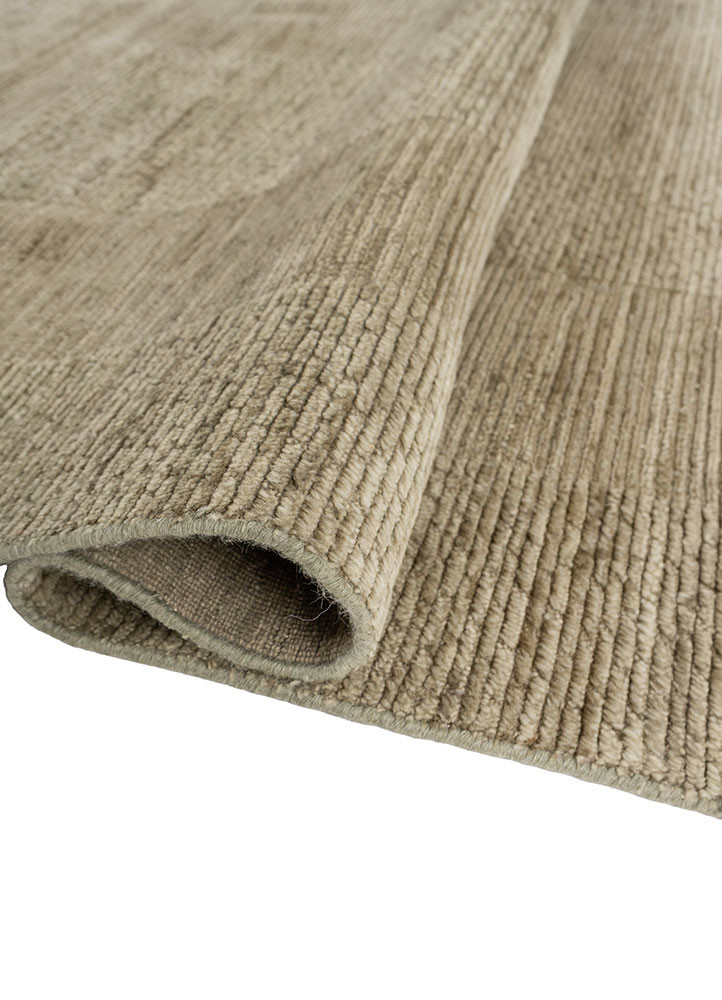 contour green wool hand loom Rug - FoldShot