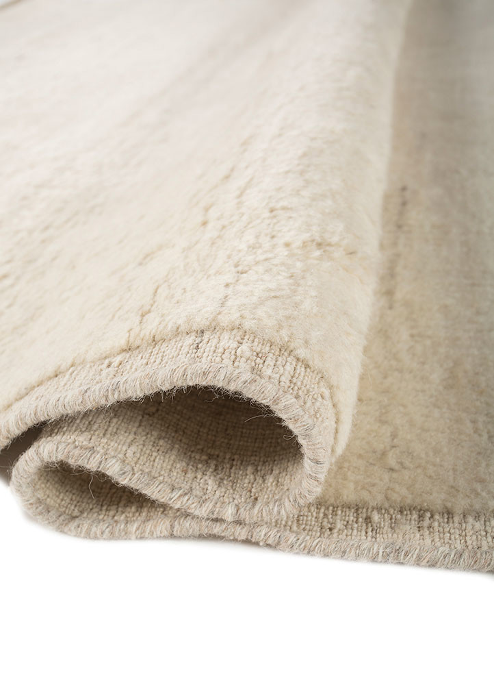 contour ivory wool hand loom Rug - FoldShot contour ivory wool hand loom Rug - FoldShot