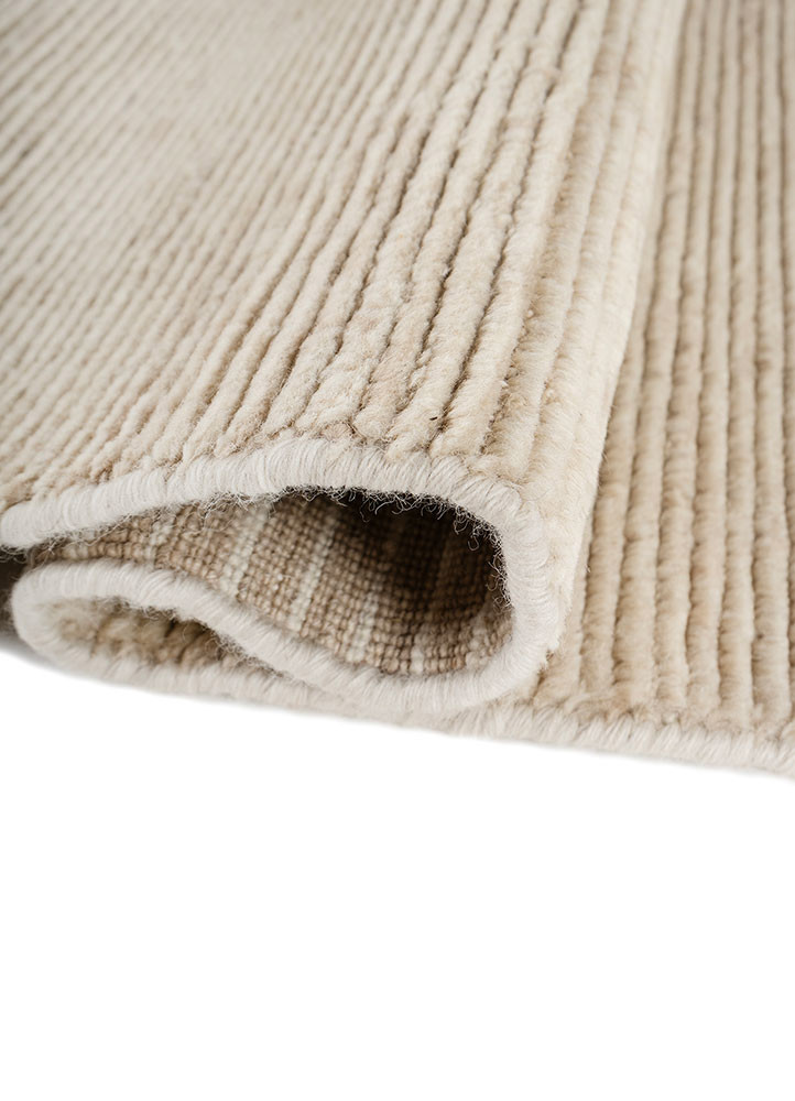 saga ivory wool hand loom Rug - FoldShot saga ivory wool hand loom Rug - FoldShot