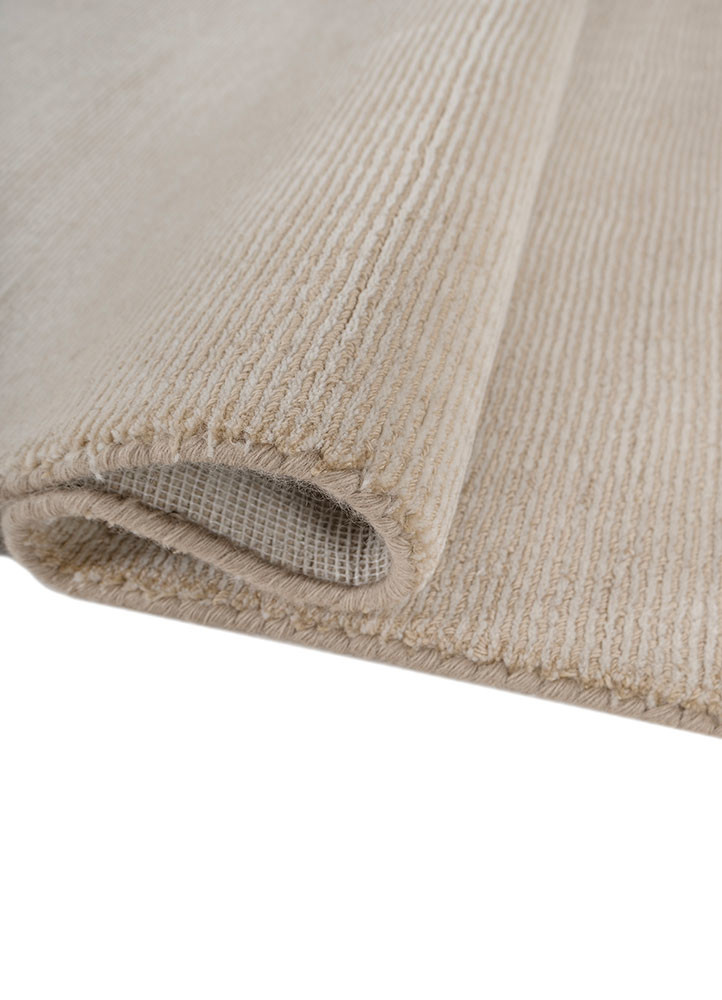 saga gold wool hand loom Rug - FoldShot