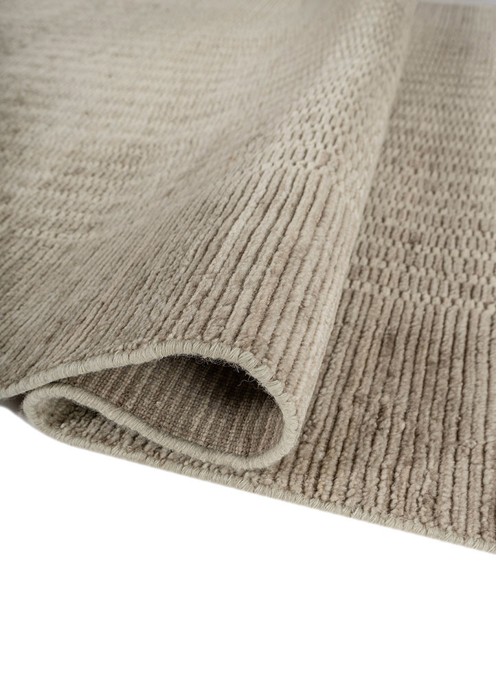 saga green wool hand loom Rug - FoldShot saga green wool hand loom Rug - FoldShot