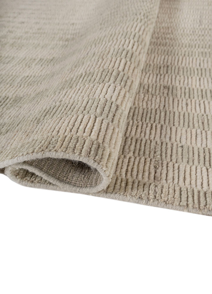 contour gold wool hand loom Rug - FoldShot