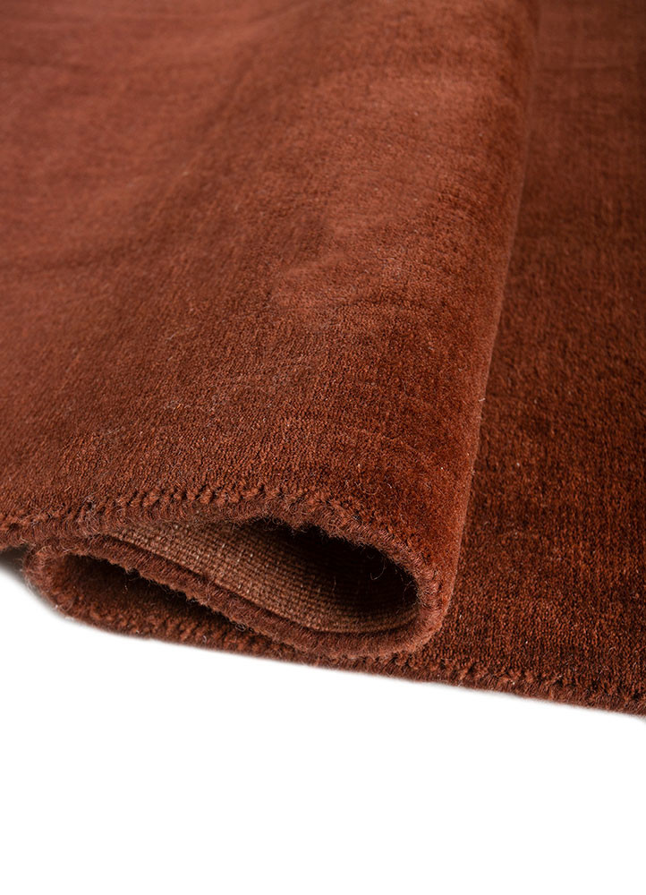 jean red and orange wool hand loom Rug - FoldShot