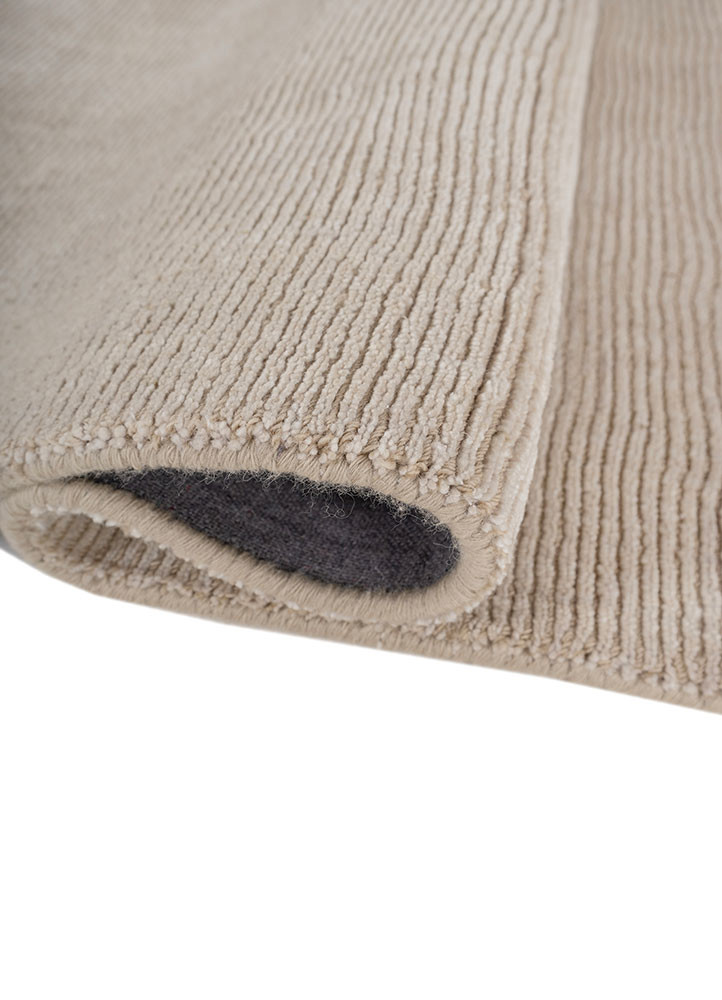 saga ivory wool and silk hand loom Rug - FoldShot