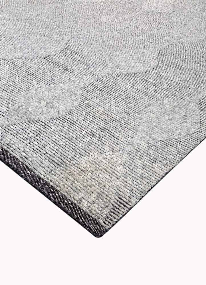 saga grey and black wool hand loom Rug - FoldShot