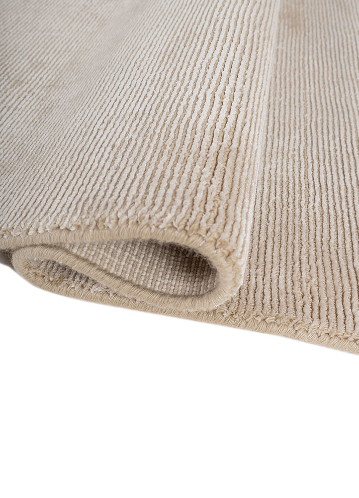contour ivory wool hand loom Rug - FoldShot