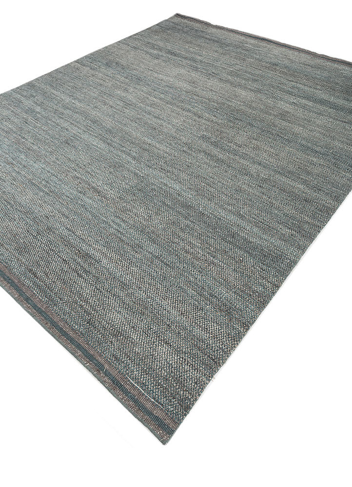 manifest blue afghan wool hand knotted Rug - FoldShot manifest blue afghan wool hand knotted Rug - FoldShot