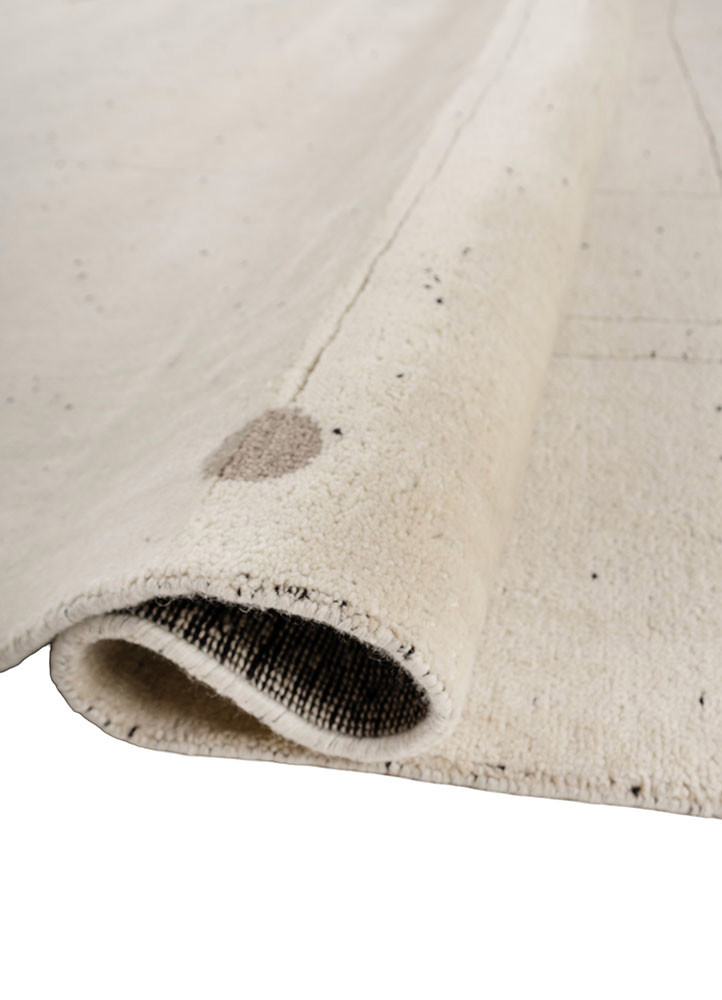 zuri ivory wool hand knotted Rug - FoldShot