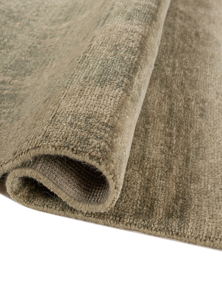 uvenuti green wool hand knotted Rug - FoldShot