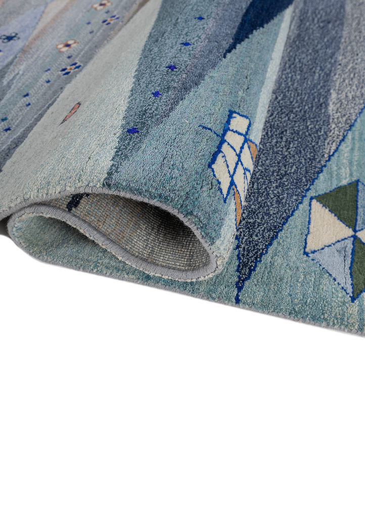 freedom manchaha blue wool and bamboo silk hand knotted Rug - FoldShot freedom manchaha blue wool and bamboo silk hand knotted Rug - FoldShot