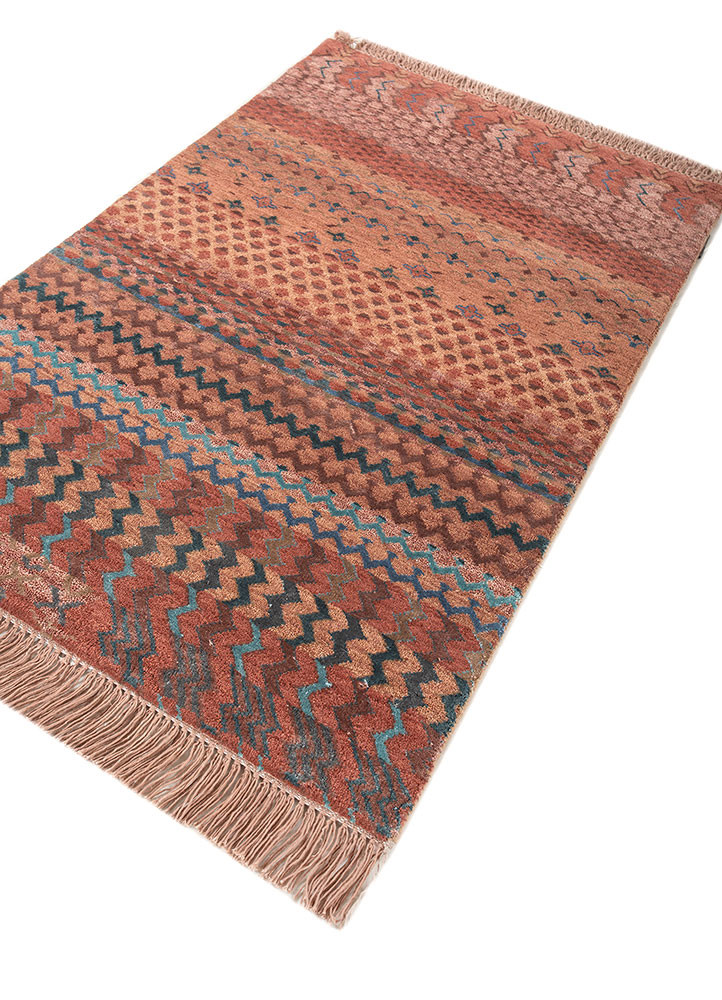 manchaha red and orange wool and bamboo silk hand knotted Rug - FoldShot manchaha red and orange wool and bamboo silk hand knotted Rug - FoldShot