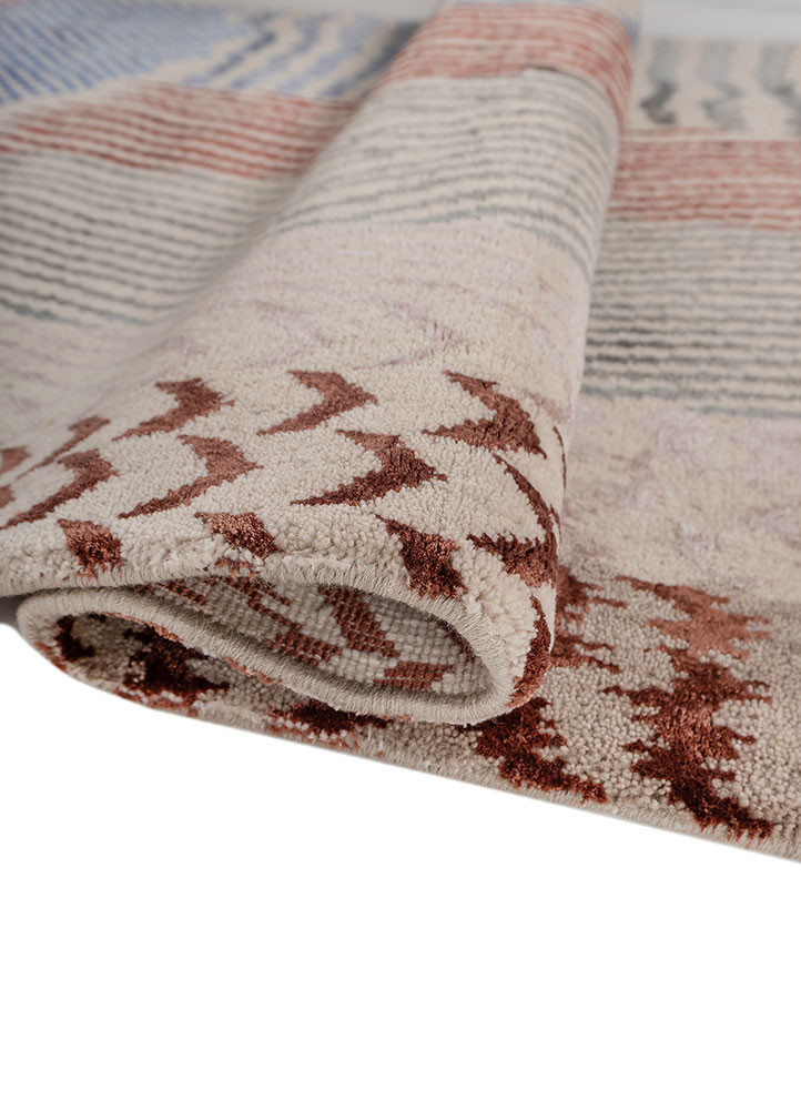manchaha red and orange wool and bamboo silk hand knotted Rug - FoldShot manchaha red and orange wool and bamboo silk hand knotted Rug - FoldShot