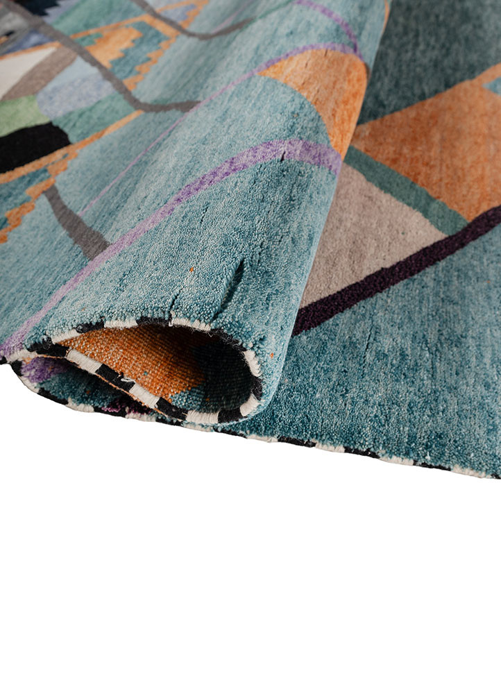 freedom manchaha blue wool and bamboo silk hand knotted Rug - FoldShot freedom manchaha blue wool and bamboo silk hand knotted Rug - FoldShot