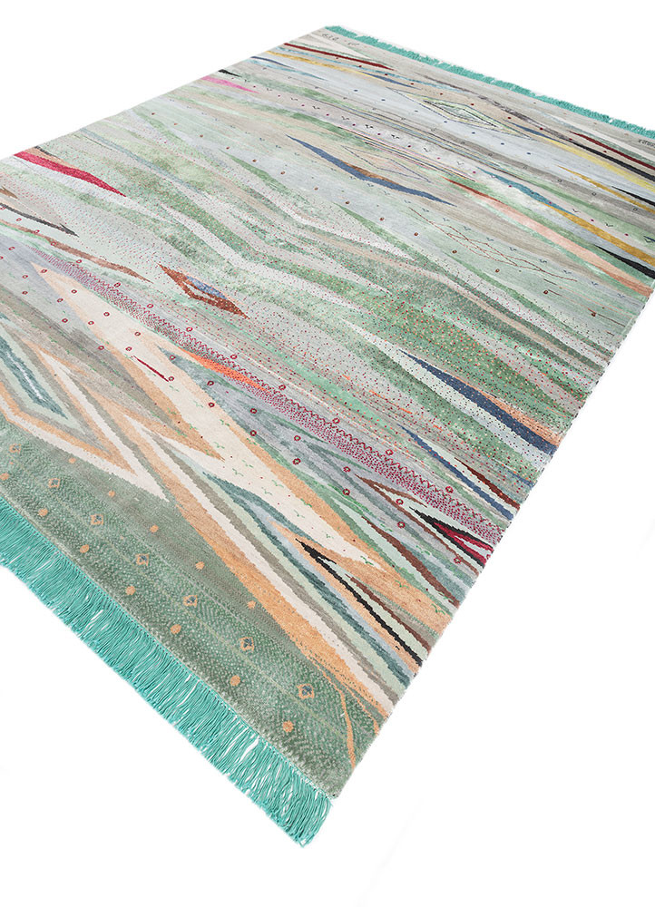 freedom manchaha blue wool and bamboo silk hand knotted Rug - FoldShot freedom manchaha blue wool and bamboo silk hand knotted Rug - FoldShot