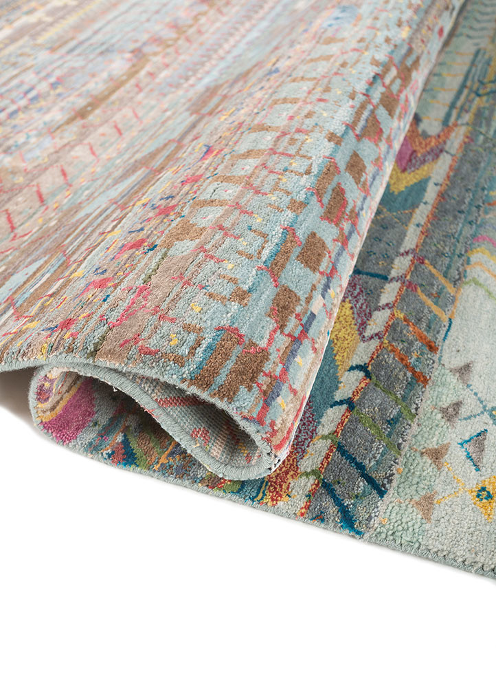 freedom manchaha blue wool and bamboo silk hand knotted Rug - FoldShot freedom manchaha blue wool and bamboo silk hand knotted Rug - FoldShot