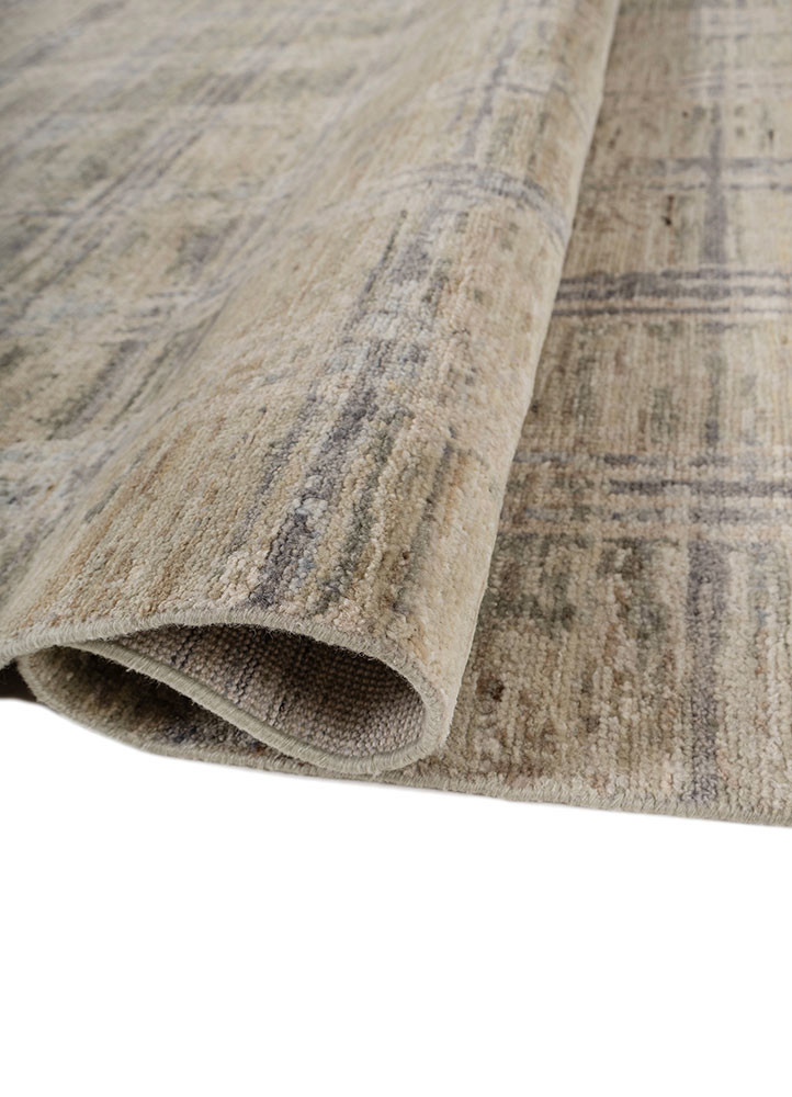 blythe ivory wool hand knotted Rug - FoldShot