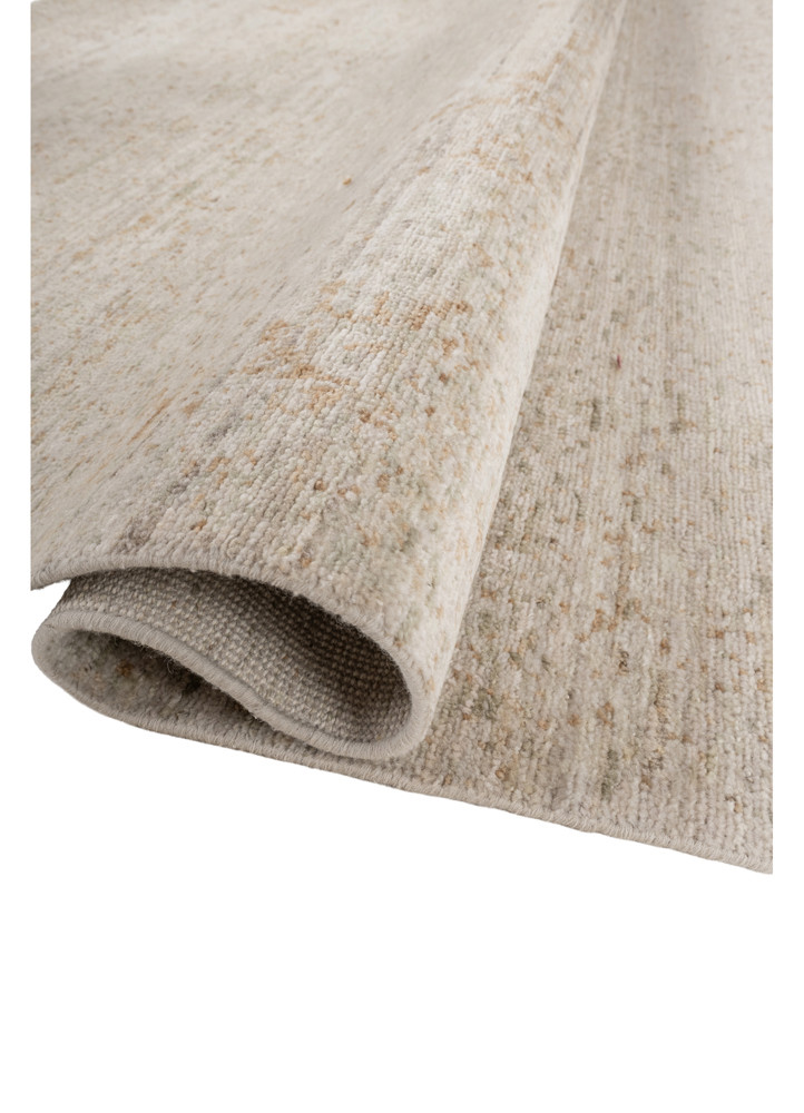aprezo ivory wool hand knotted Rug - FoldShot aprezo ivory wool hand knotted Rug - FoldShot
