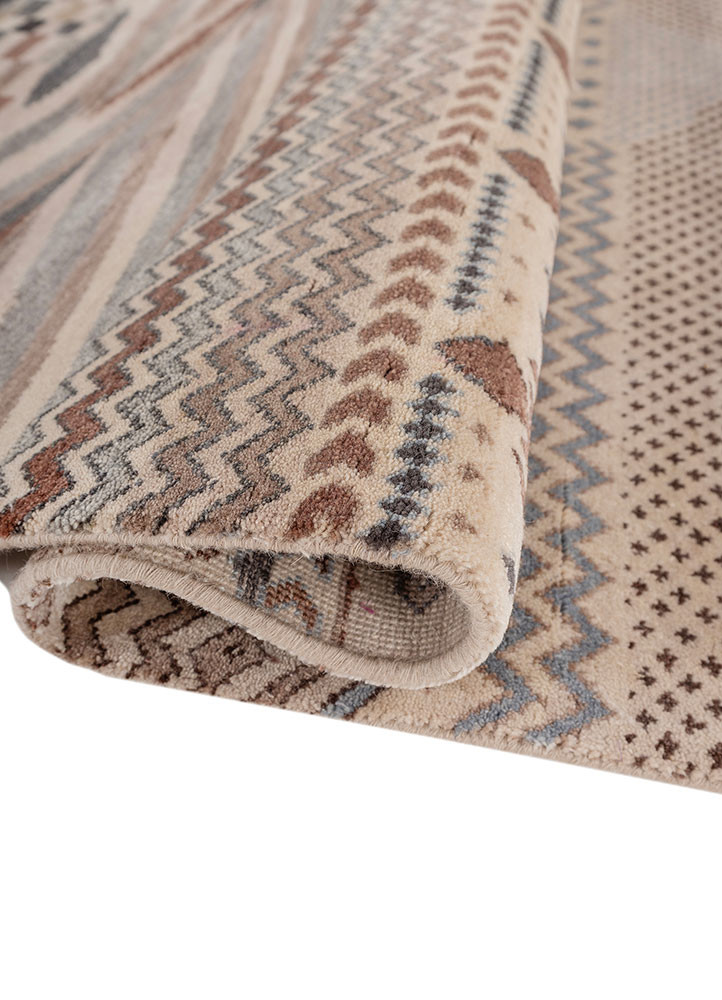 manchaha ivory wool and silk hand knotted Rug - FoldShot manchaha ivory wool and silk hand knotted Rug - FoldShot