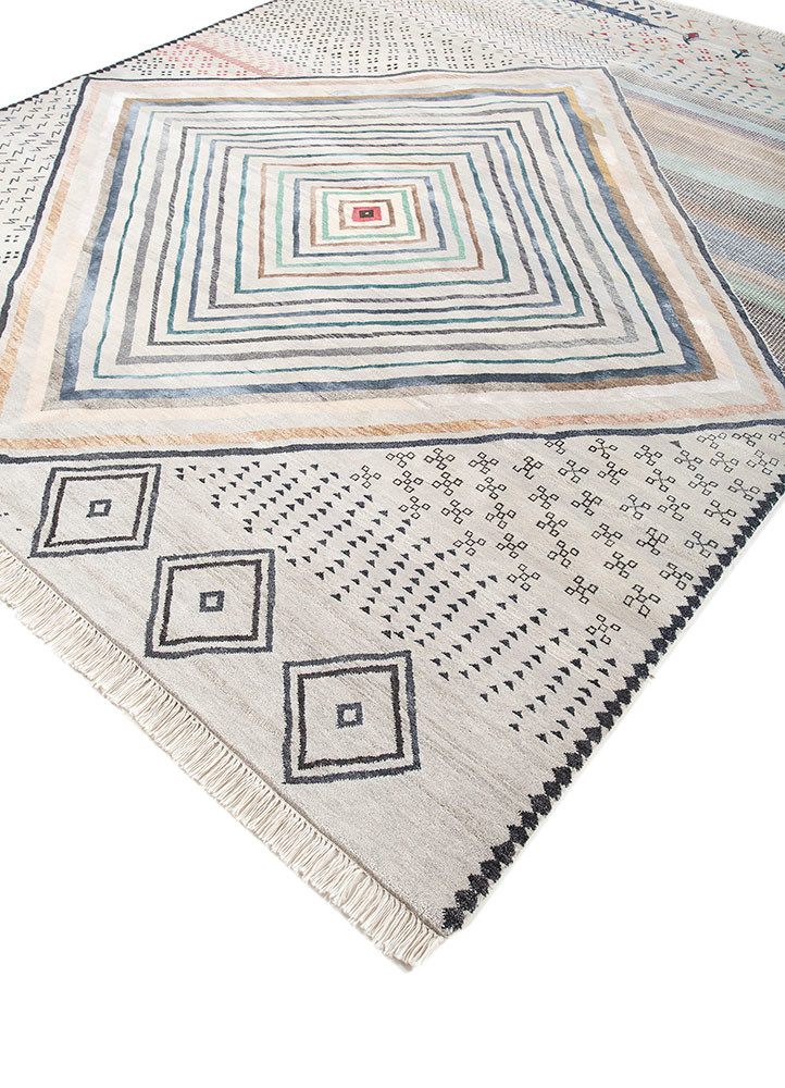 freedom manchaha ivory wool and silk hand knotted Rug - FoldShot