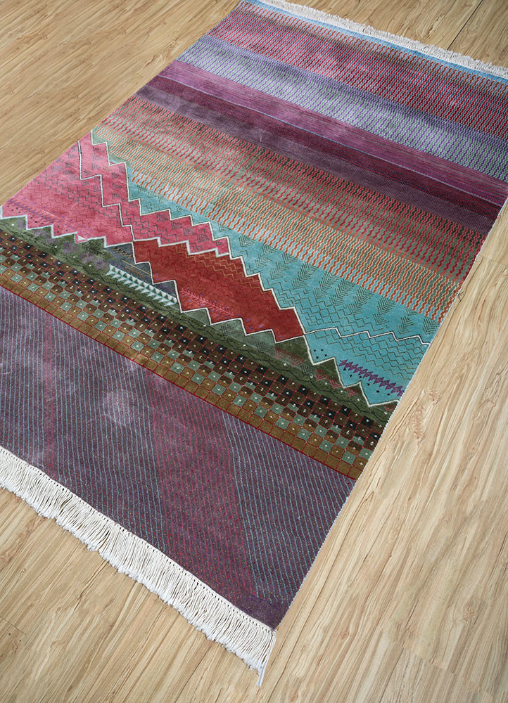 manchaha red and orange silk hand knotted Rug - FoldShot manchaha red and orange silk hand knotted Rug - FoldShot