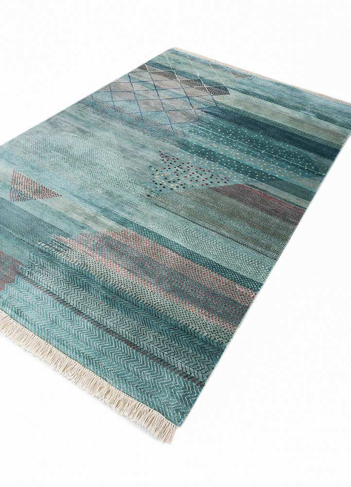 manchaha blue silk hand knotted Rug - FoldShot manchaha blue silk hand knotted Rug - FoldShot
