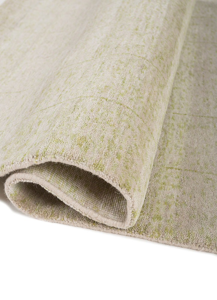 kavi x manchaha green wool hand knotted Rug - FoldShot kavi x manchaha green wool hand knotted Rug - FoldShot