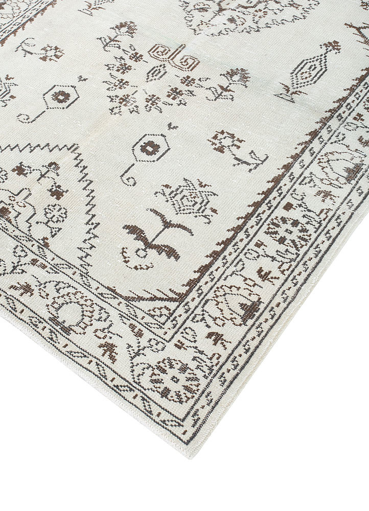 vintage beige and brown wool hand knotted Rug - FoldShot vintage beige and brown wool hand knotted Rug - FoldShot