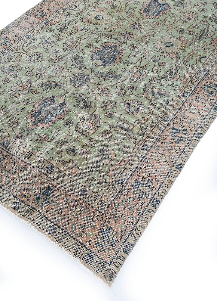 vintage green wool hand knotted Rug - FoldShot vintage green wool hand knotted Rug - FoldShot