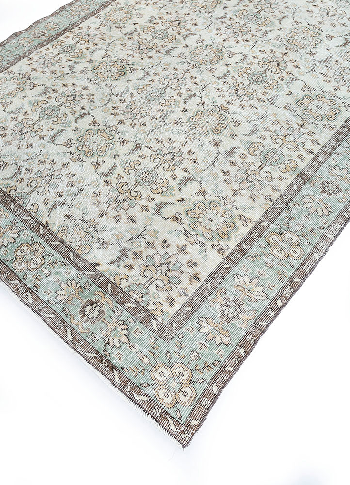 vintage green wool hand knotted Rug - FoldShot vintage green wool hand knotted Rug - FoldShot
