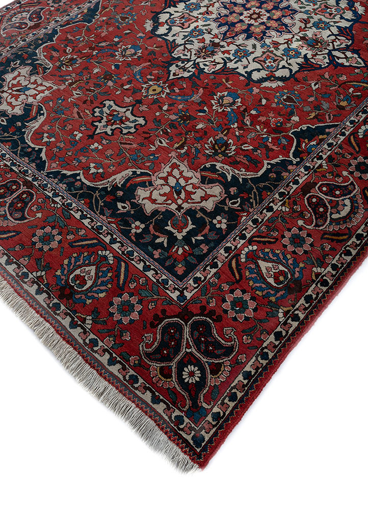 aalam red and orange wool hand knotted Rug - FoldShot aalam red and orange wool hand knotted Rug - FoldShot