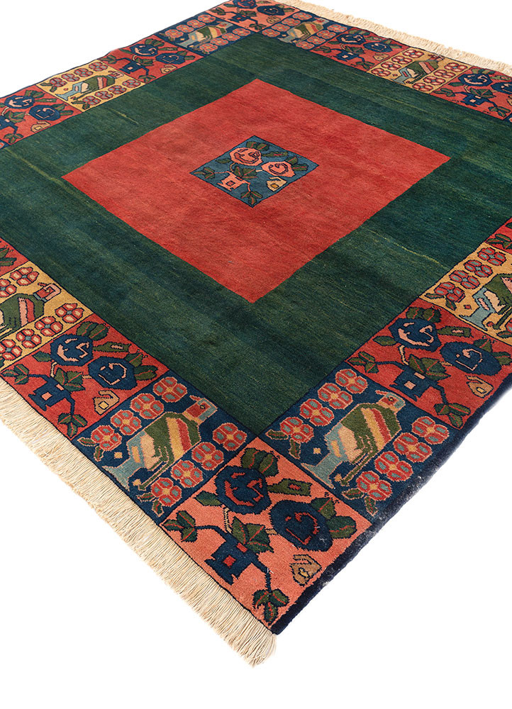 aalam red and orange wool hand knotted Rug - FoldShot aalam red and orange wool hand knotted Rug - FoldShot