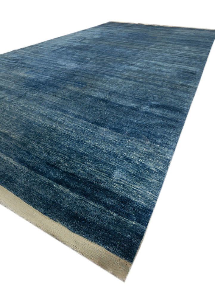 zuri blue wool hand knotted Rug - FoldShot zuri blue wool hand knotted Rug - FoldShot