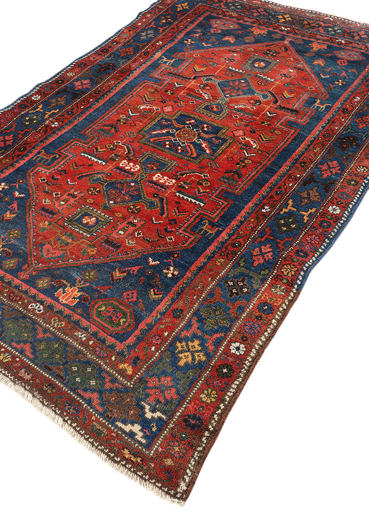 nuray red and orange wool hand knotted Rug - FoldShot nuray red and orange wool hand knotted Rug - FoldShot