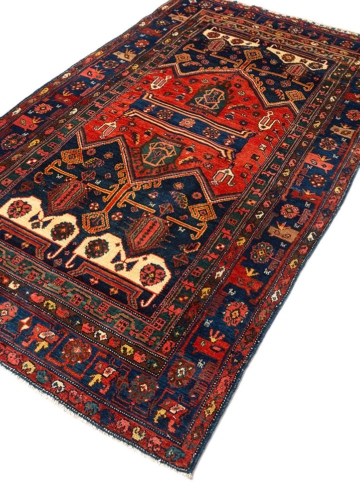 aalam red and orange wool hand knotted Rug - FoldShot aalam red and orange wool hand knotted Rug - FoldShot