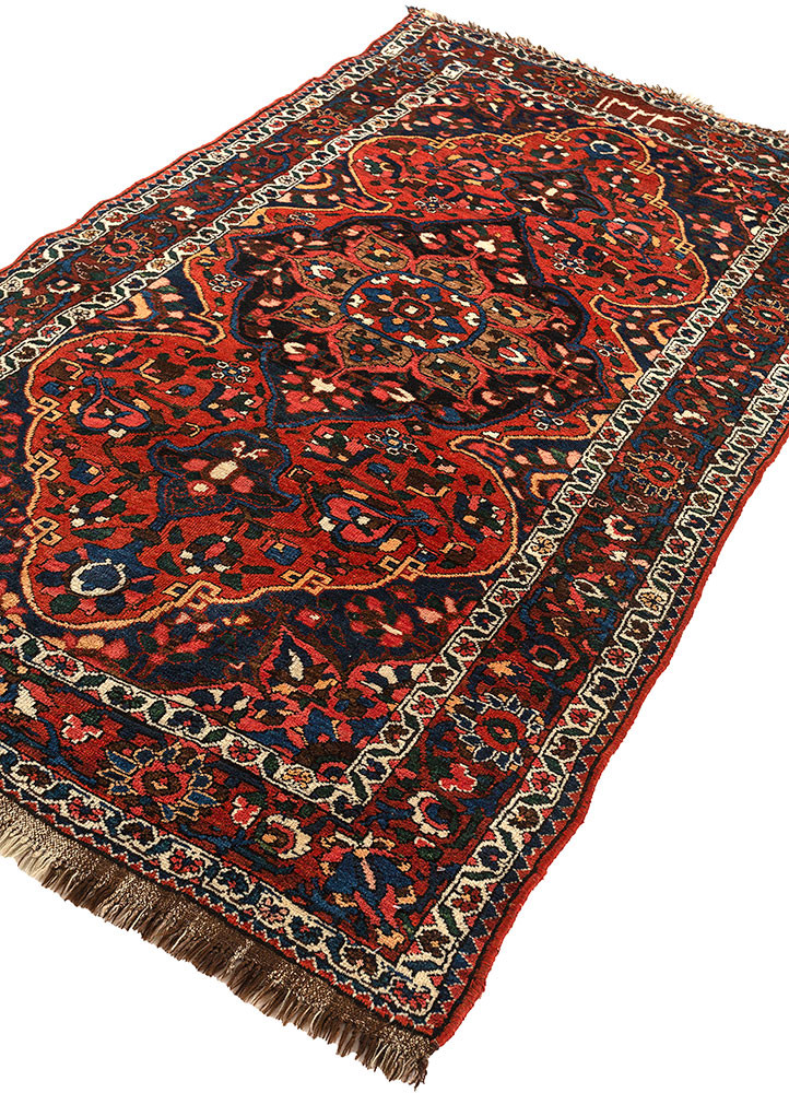 aalam red and orange wool hand knotted Rug - FoldShot aalam red and orange wool hand knotted Rug - FoldShot