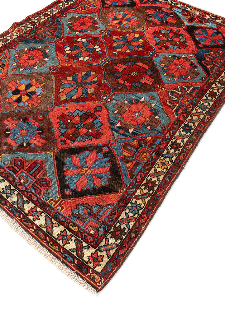 aalam red and orange wool hand knotted Rug - FoldShot aalam red and orange wool hand knotted Rug - FoldShot