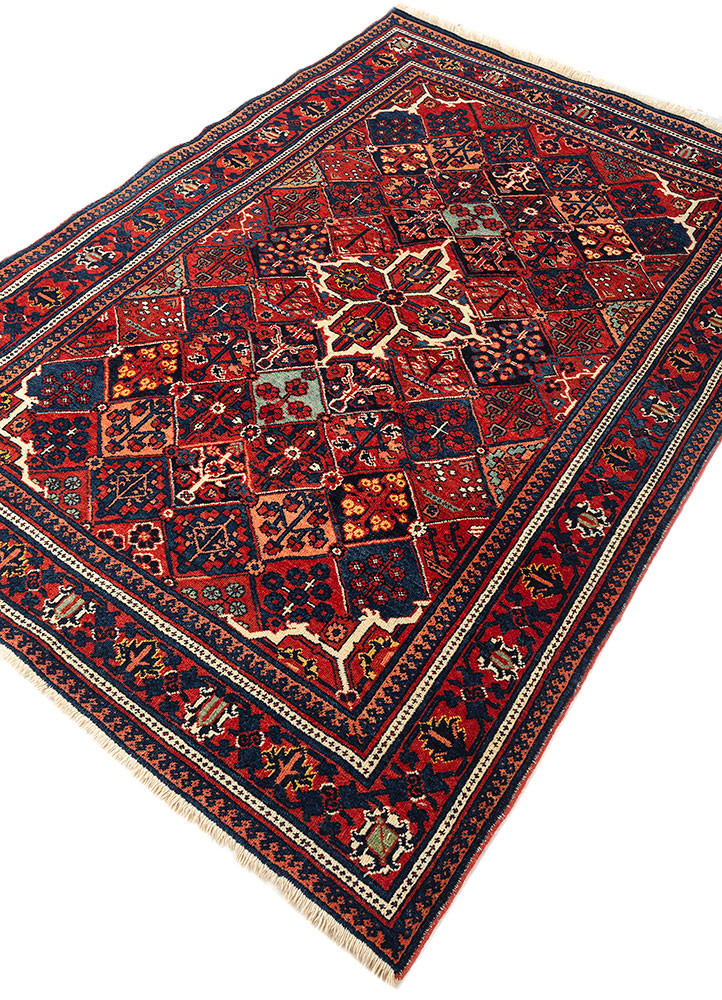 aalam red and orange wool hand knotted Rug - FoldShot aalam red and orange wool hand knotted Rug - FoldShot