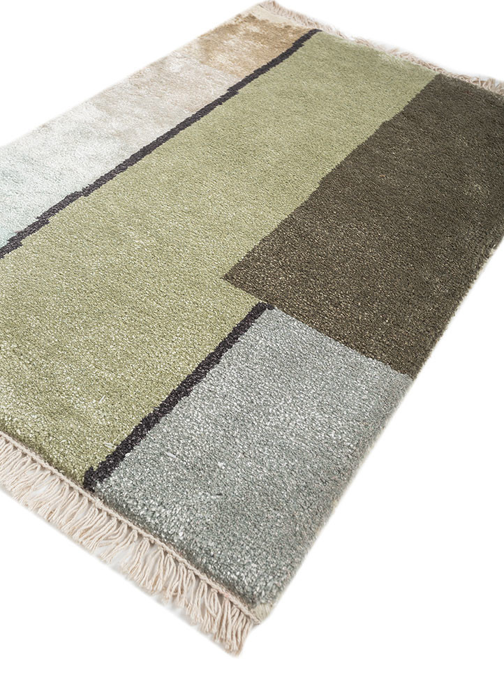 aprezo green wool and bamboo silk hand knotted Rug - FoldShot aprezo green wool and bamboo silk hand knotted Rug - FoldShot