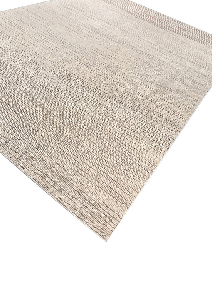 aprezo ivory wool hand knotted Rug - FoldShot aprezo ivory wool hand knotted Rug - FoldShot