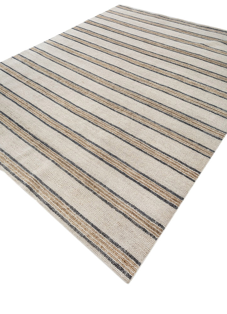 manifest ivory wool hand knotted Rug - FoldShot manifest ivory wool hand knotted Rug - FoldShot