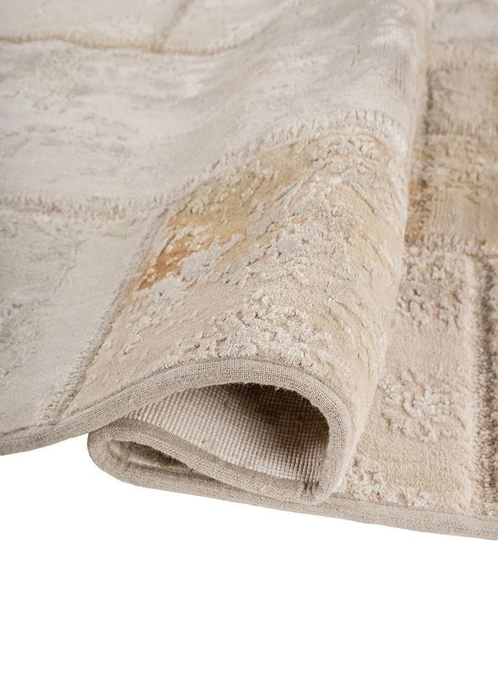 aprezo ivory wool and bamboo silk hand knotted Rug - FoldShot aprezo ivory wool and bamboo silk hand knotted Rug - FoldShot