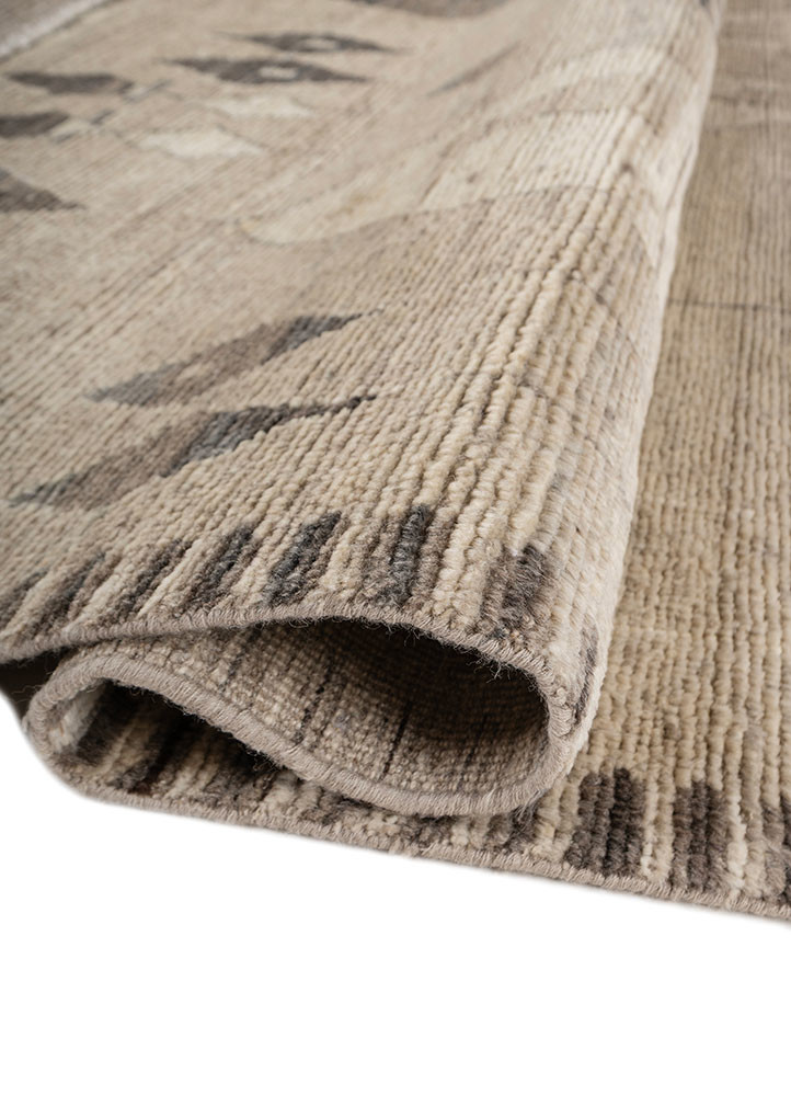 manifest beige and brown afghan wool hand knotted Rug - FoldShot manifest beige and brown afghan wool hand knotted Rug - FoldShot