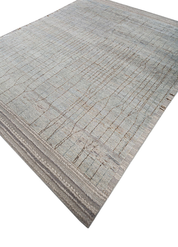 manifest blue afghan wool hand knotted Rug - FoldShot manifest blue afghan wool hand knotted Rug - FoldShot